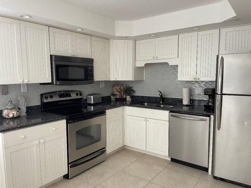 Kitchen that is fully stocked with cookware etc.