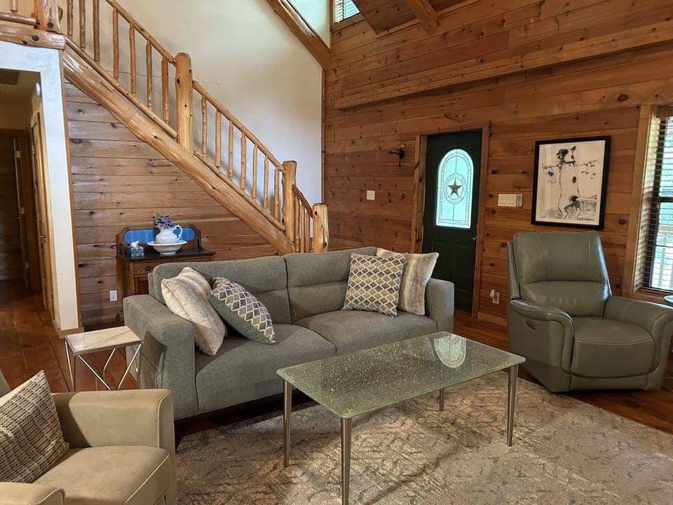 Downstairs living is comfy and central for great conversations.