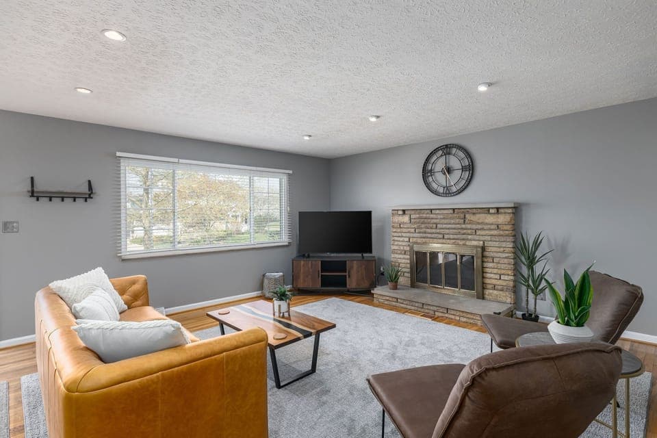 Main living room with large window that provides plenty of natural light