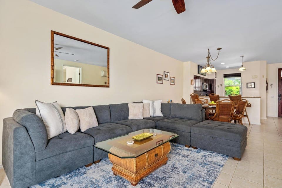 Cozy sectional anchors the open concept living area.