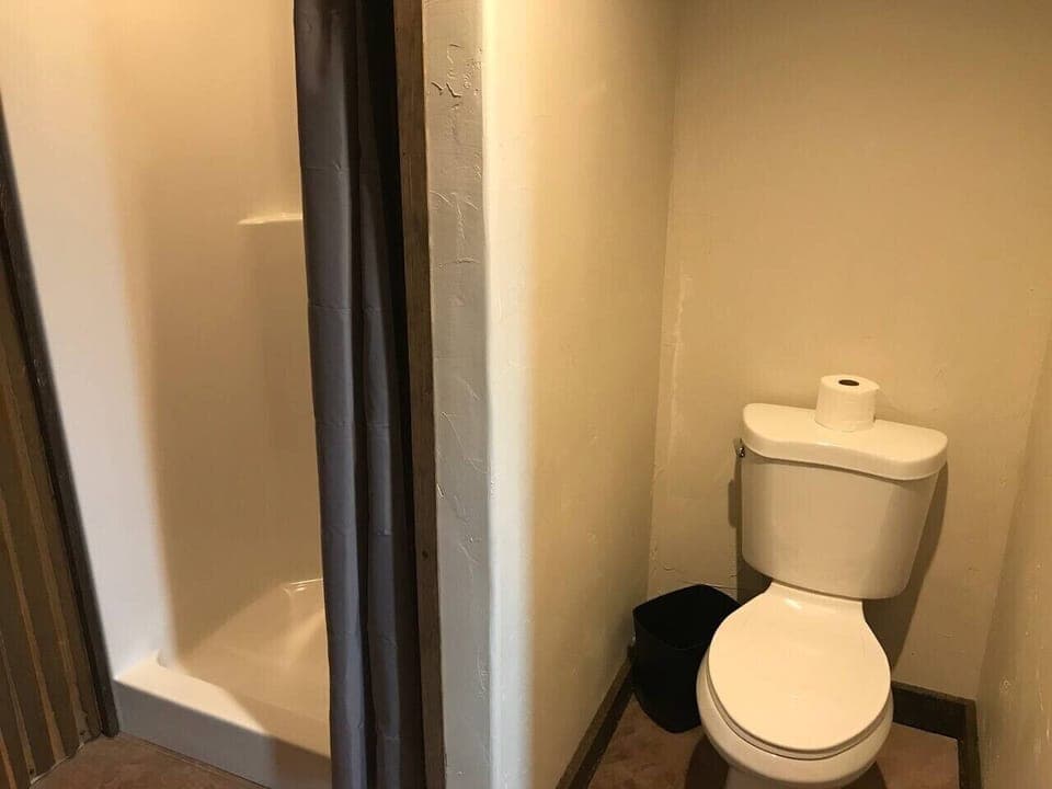Two full service private bathrooms shared by up to 10 cabin guests