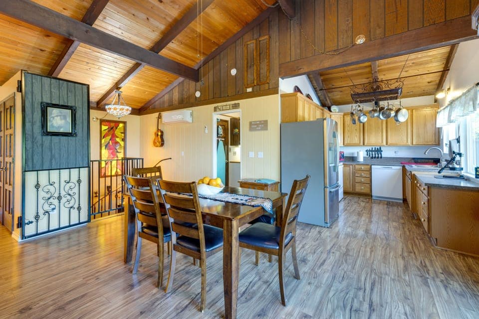 Fully Stocked Kitchen | Dining Seating for 6 | Spiral Staircase Down to Bedrooms