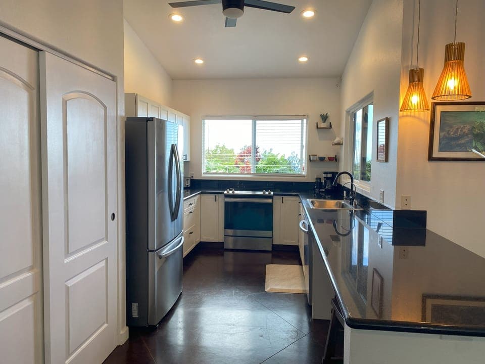 Lots of countertop space in the kitchen as well as a closet pantry