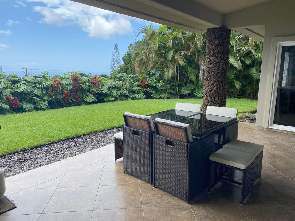 Private garden lanai with ocean view.