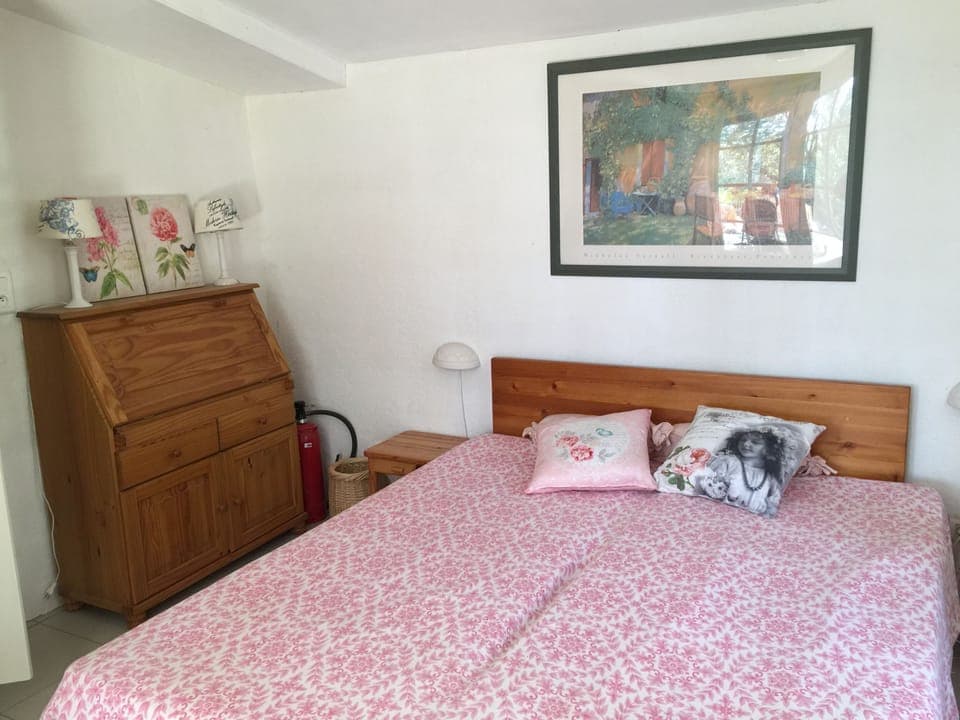 Parents bedroom with doors to terrace and gardens