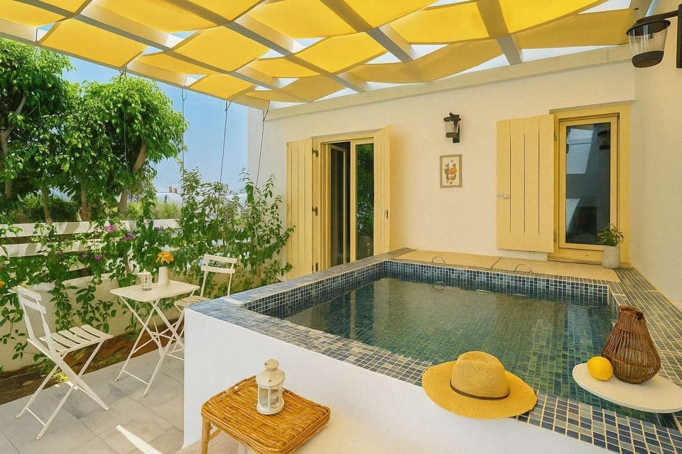 Experience the exterior, featuring a private jacuzzi for a luxurious and relaxing retreat