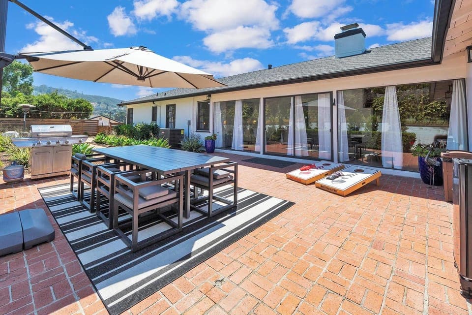 Dine al fresco after a game of cornhole.