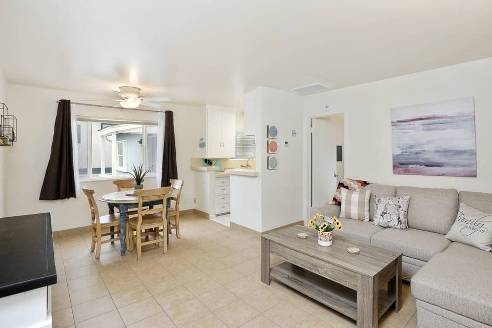 The living room area has a sofa that converts into a full bed for guest comfort!