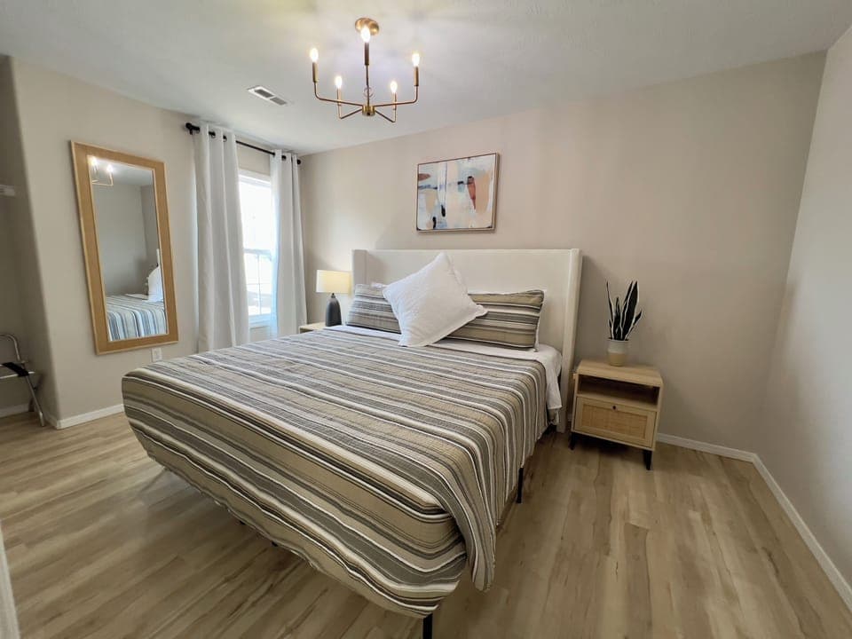 Main floor king bedroom with full private bath