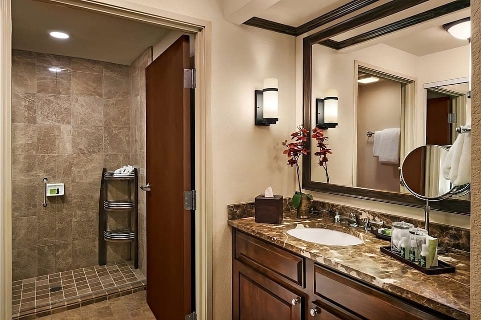 Start your day with a spacious shower and luxe finishes.