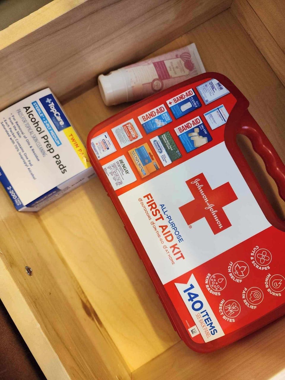 Each bathroom has a small first-aid kit
