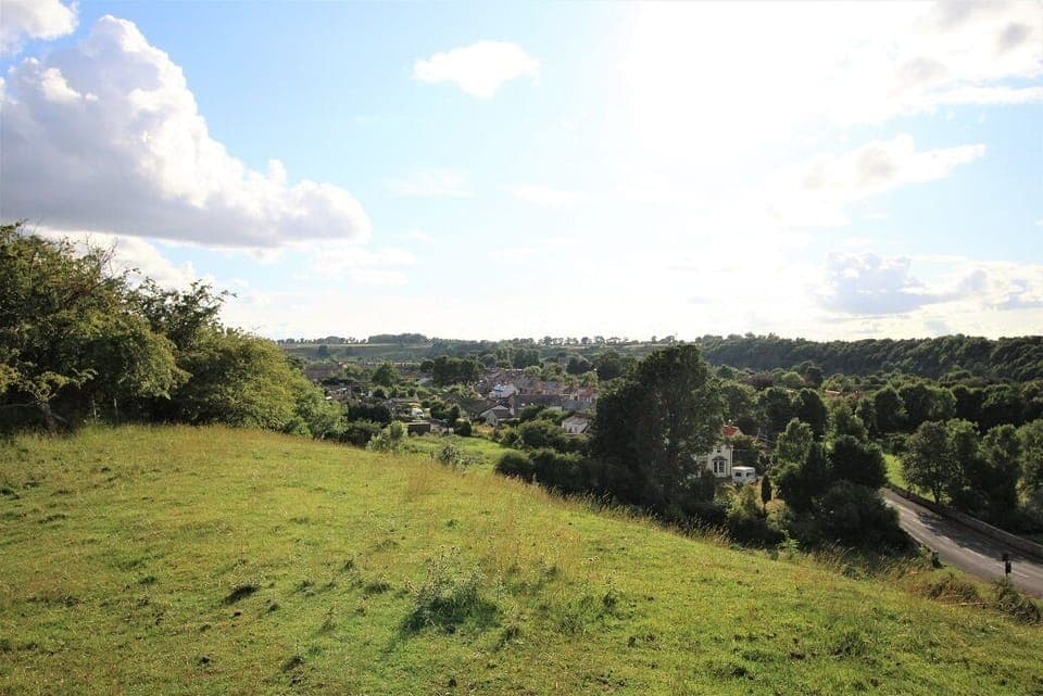 View over Norham across the field from the castle