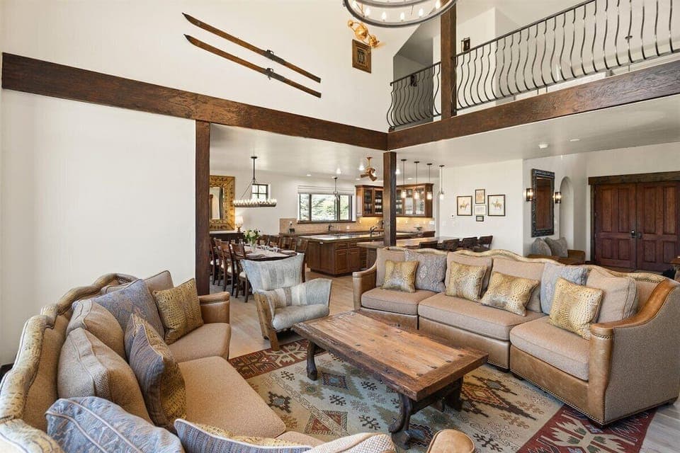 Comfortable living area with gas fireplace, smart-TV, comfy sofas and expansive views.