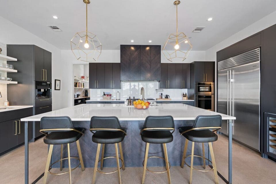 A fully equipped kitchen featuring a spacious island counter, perfect for cooking and gathering.