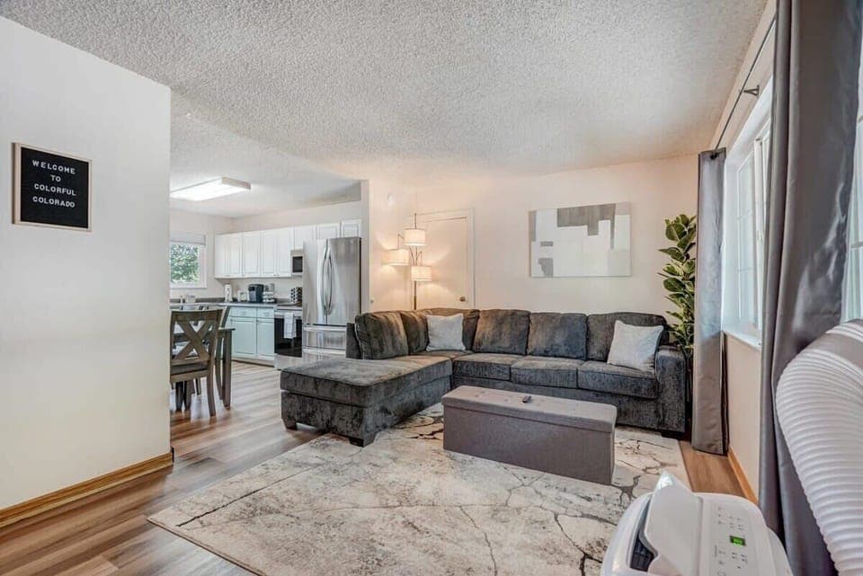 Spacious and cozy, the min level living room is complete with a large smart TV and a pull out sleeper sofa for those extra guests.!