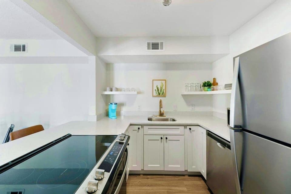 Fully stocked kitchen with quartz countertops