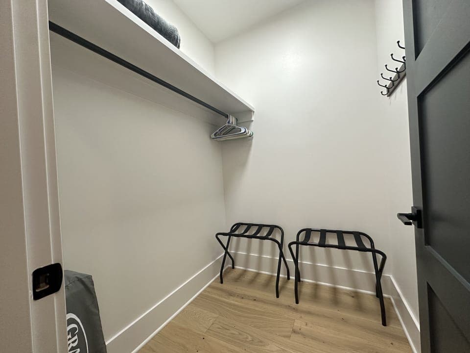 Bedroom #1 walk in closet with pack n' play