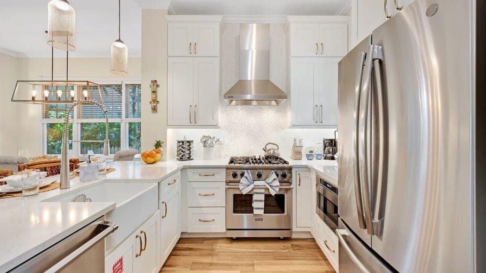 The fully equipped kitchen has top-of-the-line stainless steel appliances...