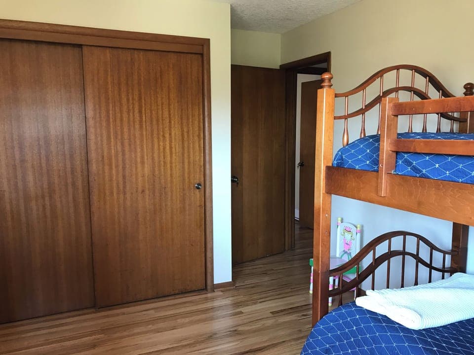 Bunkbed room door. Beyond is the door to master bedroom. Bedrooms are close.