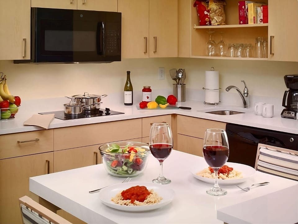 Cook and sip wine in a fully equipped, bright kitchen.