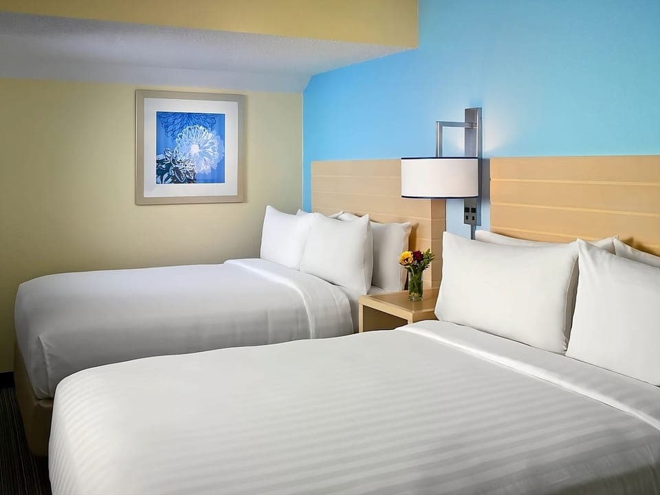 Unwind in crisp linens with plenty of space to recharge.