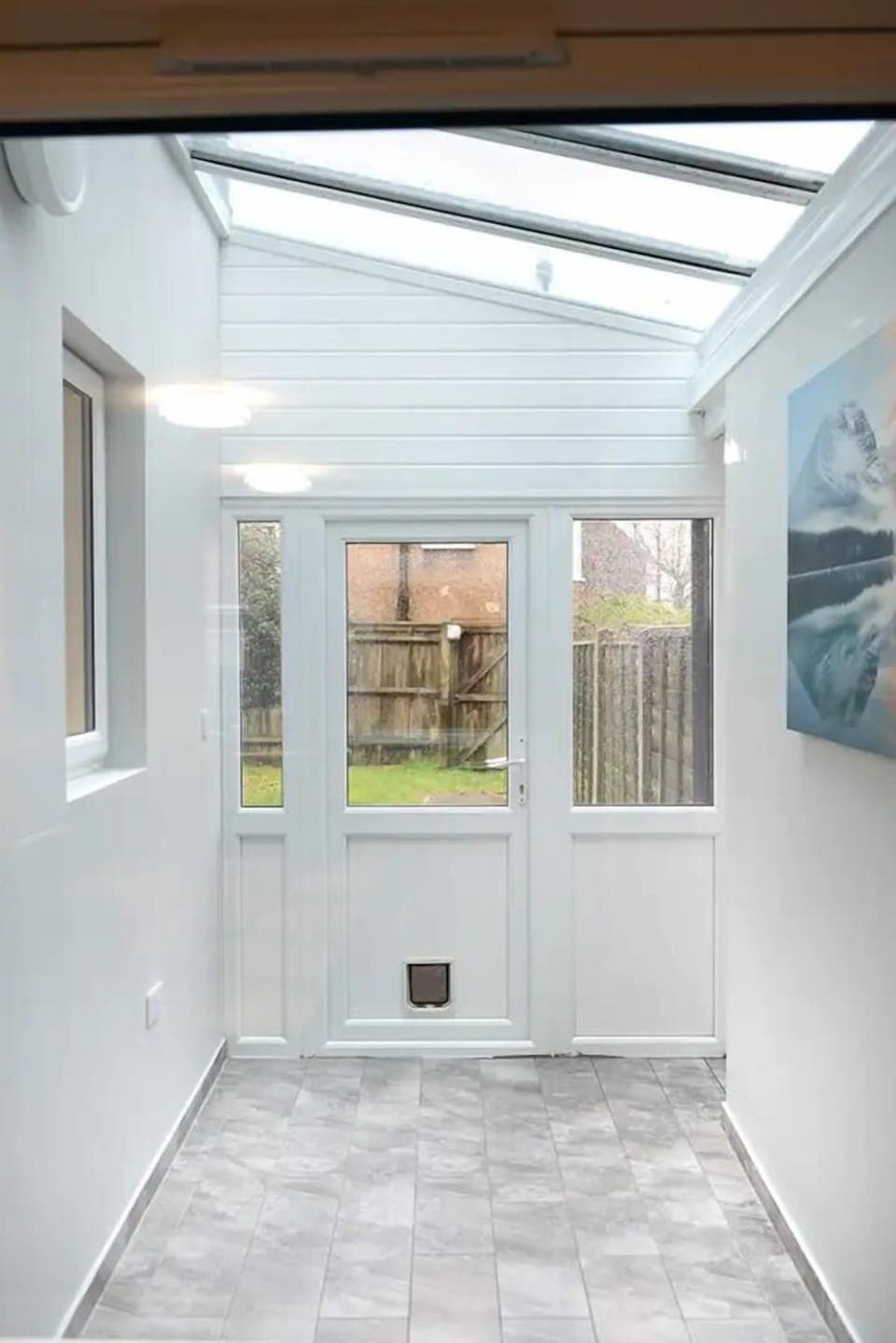 Seamless transition to a serene lawn space for a breath of fresh air.