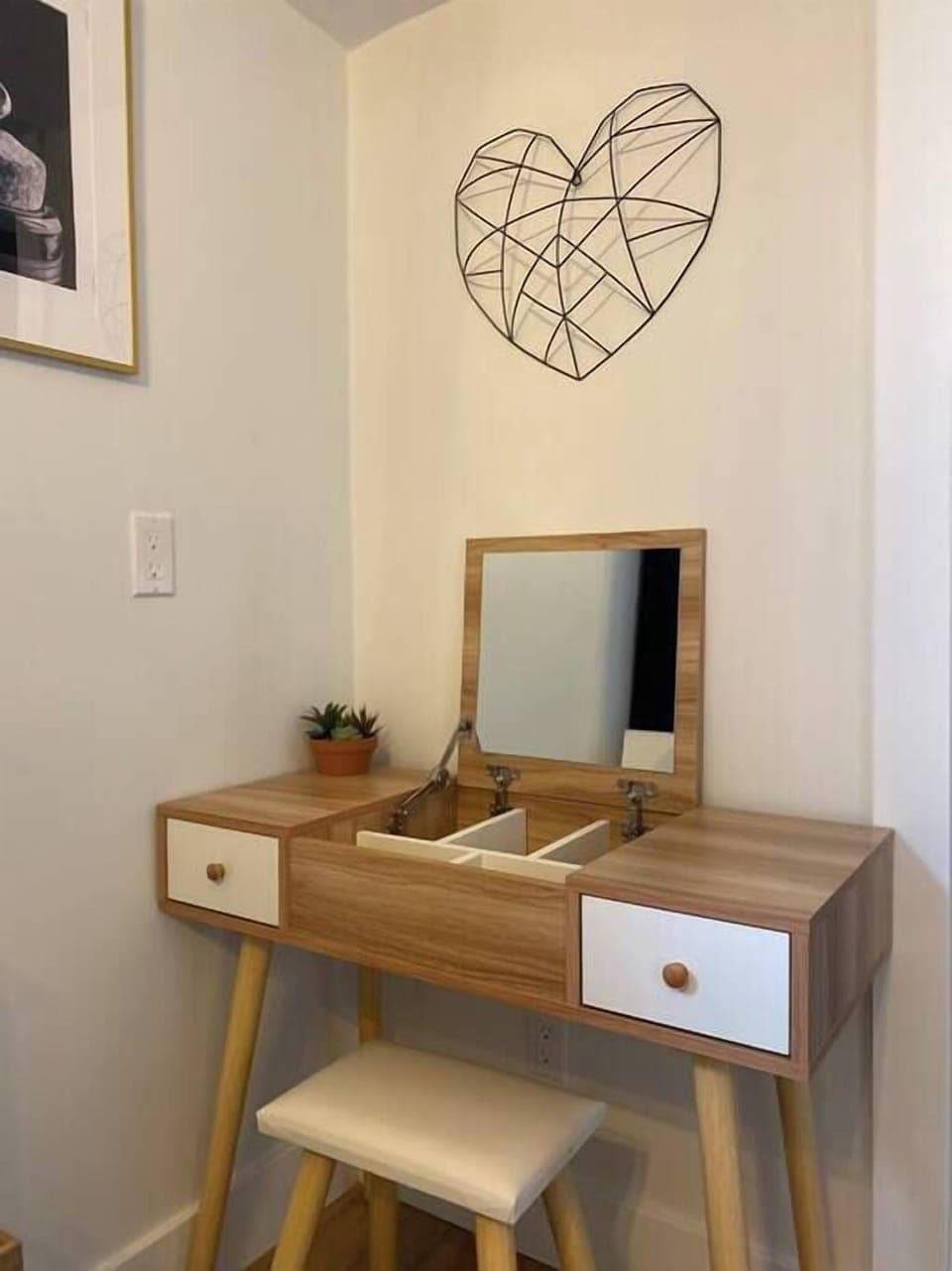 No need to hog the bathroom ladies - the master bedroom has it's own make-up station.