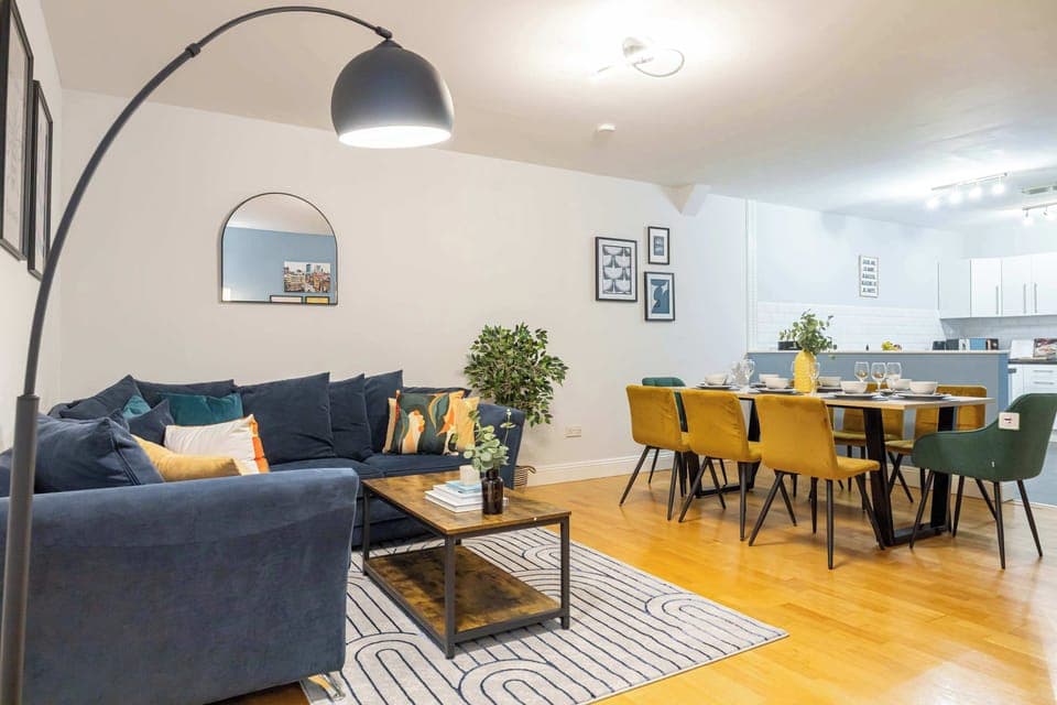 Gather your loved ones in this cozy living room with ample seating and charm.