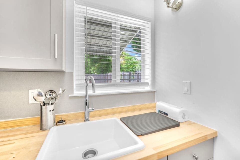 Mini kitchen with the basic essentials with sufficient space for your culinary needs.