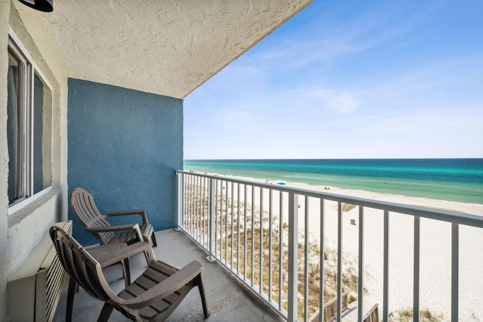 Sip morning coffee while waves roll in below.