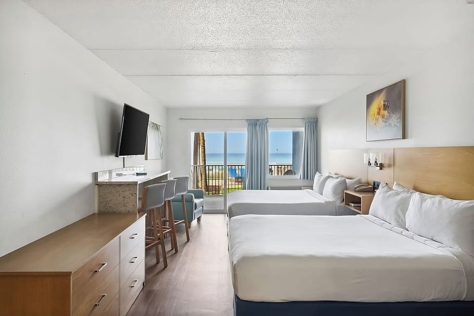 Wake up to ocean views from crisp beds and balcony.