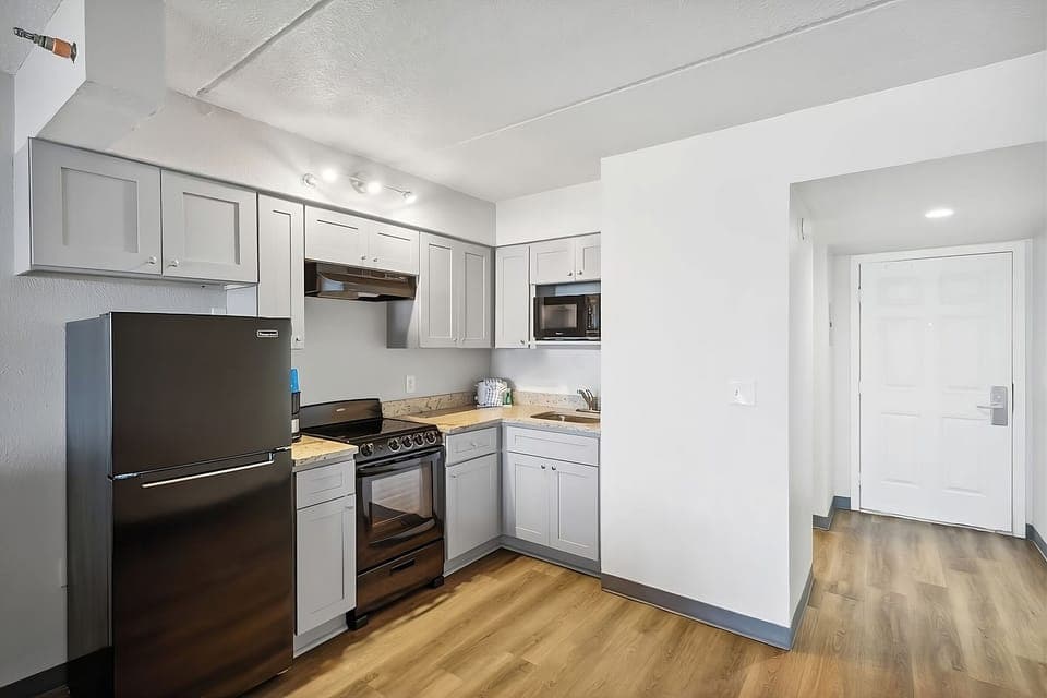 Cook simple meals easily in the sleek, stocked kitchenette