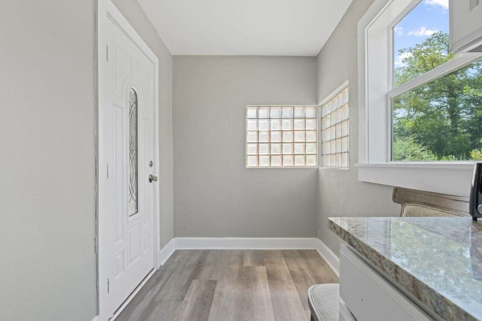Bright and welcoming entryway with plenty of natural light to greet you as you arrive