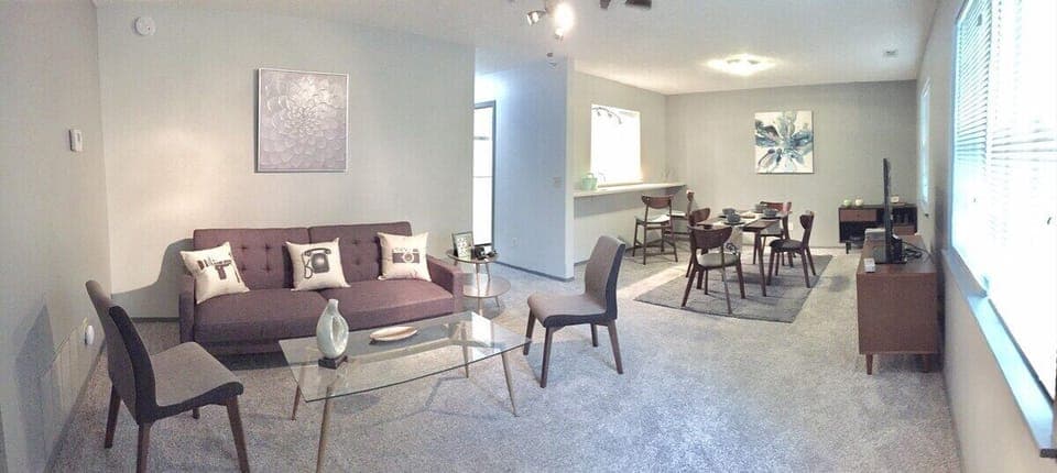 RETRO DECOR 60s    A view of the living room, dining room and bar