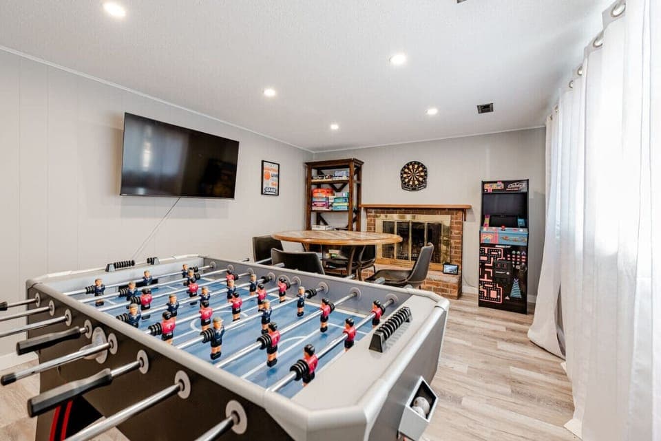 Game room with tons of games, foosball & Ms. Packman Arcade game