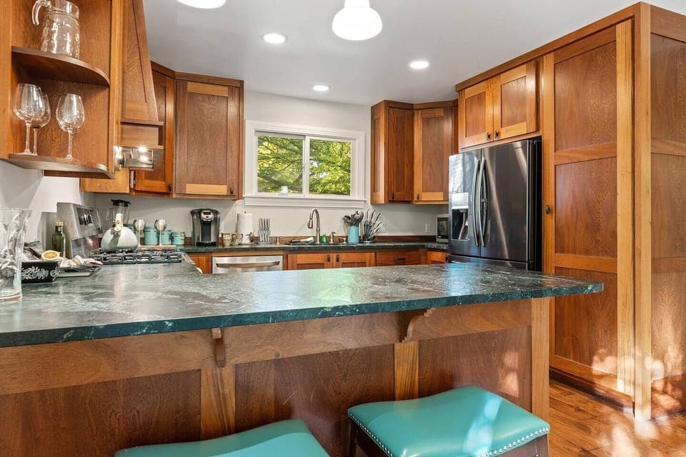 Sandstone countertops in classic Craftsman style kitchen