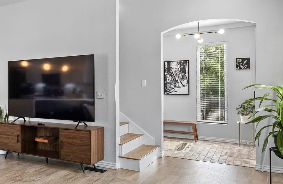 Entryway to Living Room / Kitchen and Stairs