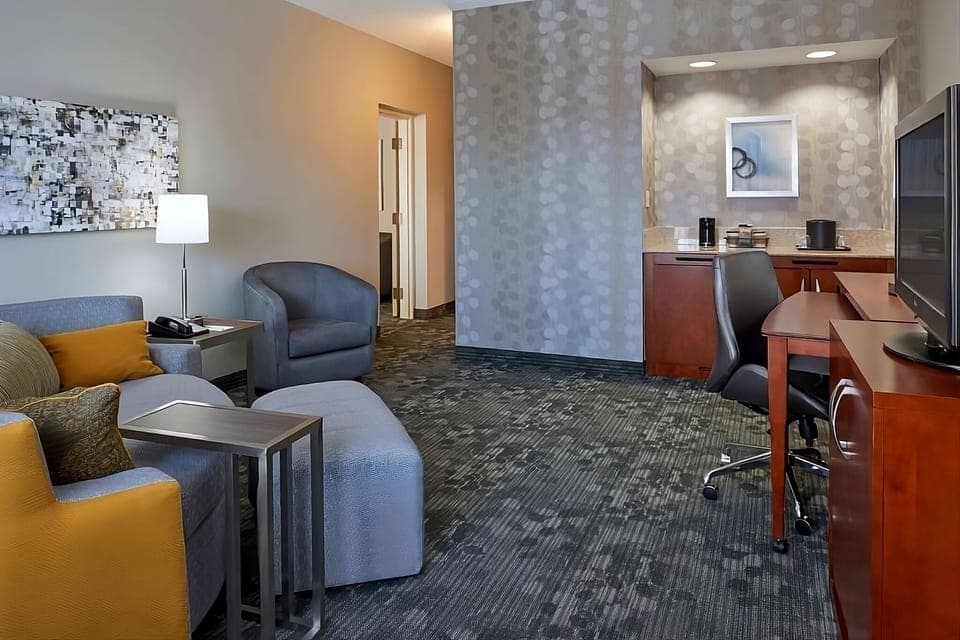 Stretch out in a spacious suite with dedicated work area.