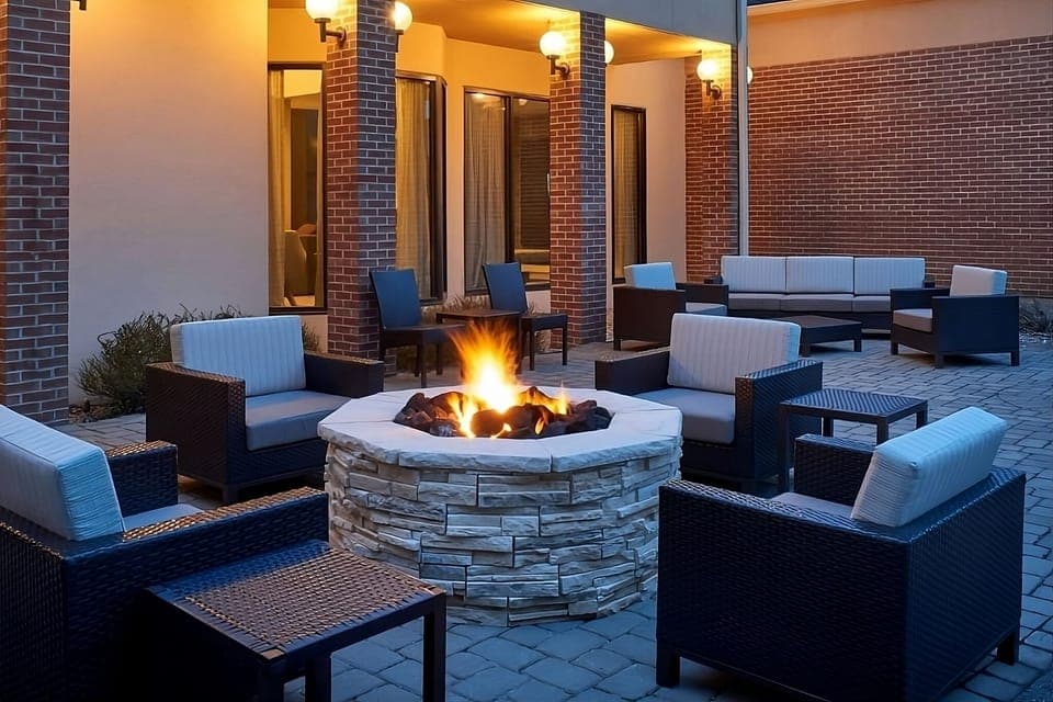 Gather around the glowing firepit for relaxed evening chats.
