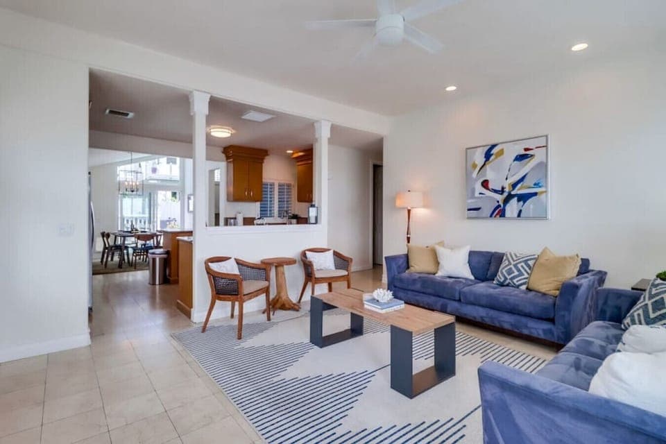 This living area is ideal for entertaining as it opens up to the kitchen.