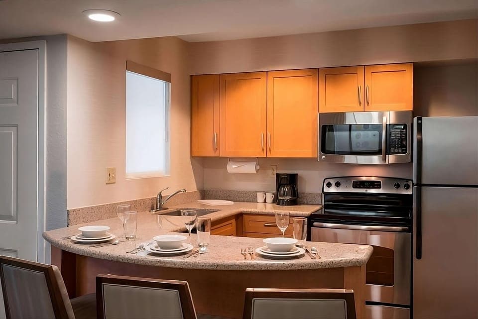 Cook and gather comfortably in a fully equipped, modern kitchen.