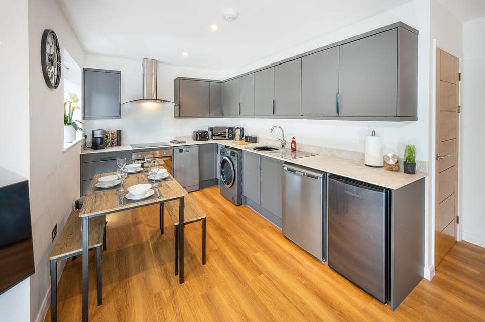 Open dining area and kitchen, offering a seamless space to cook, dine, and enjoy quality time together