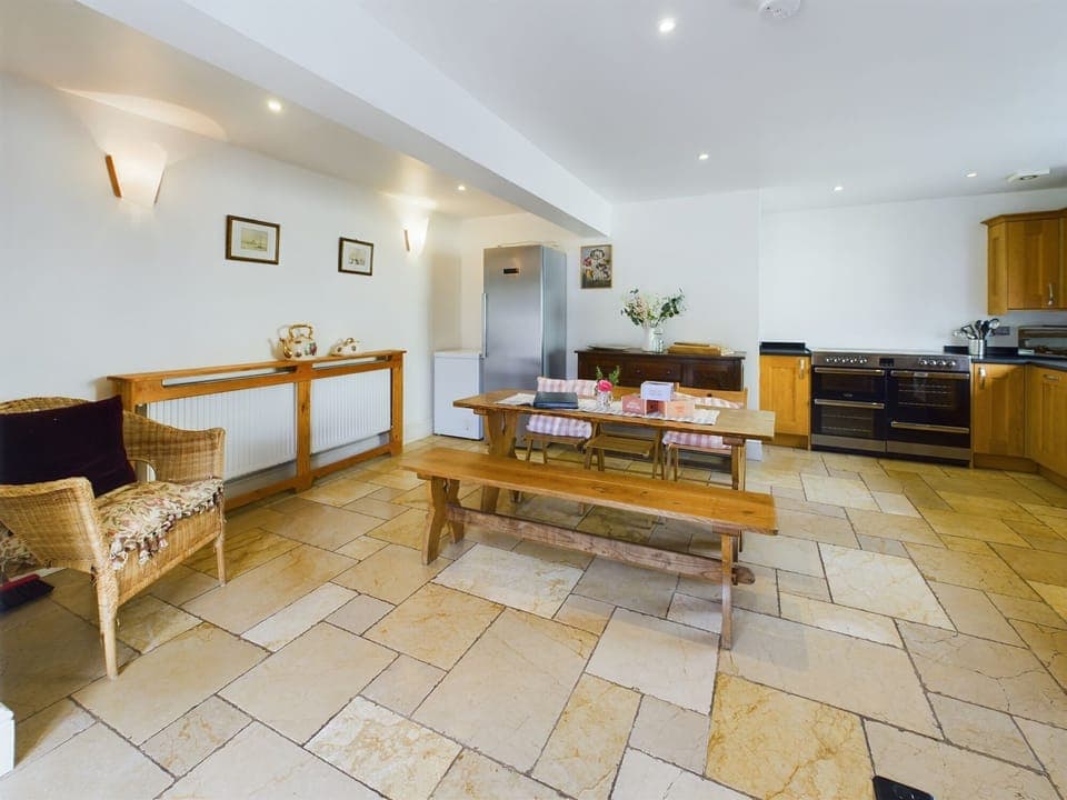 The kitchen has plenty of space to cook and prepare meals for the whole group.