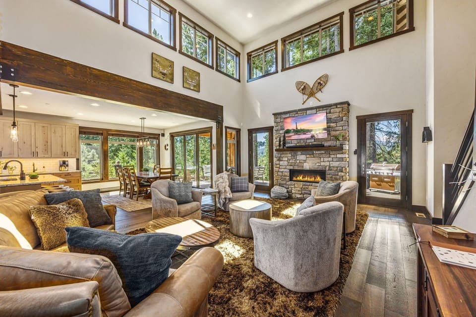Vaulted Living Room w/ Stone Gas Fireplace + Designer Furnishings