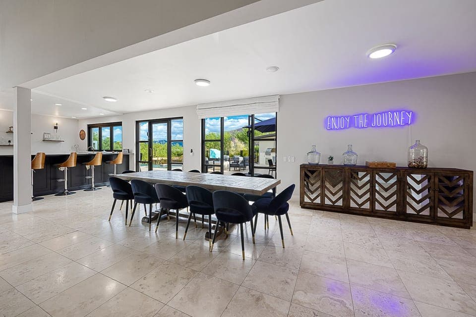 12-person dining area located near the bar & back patio