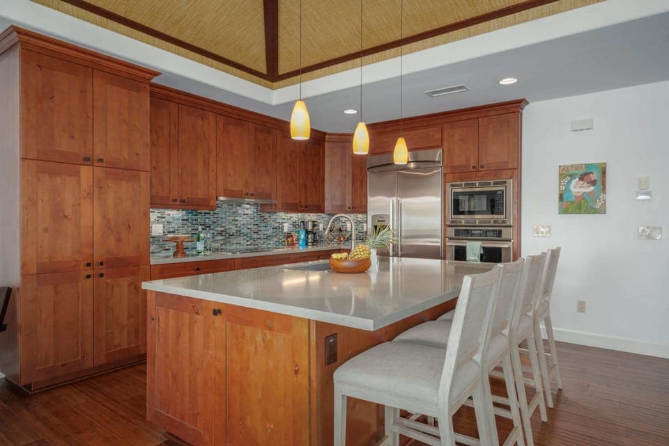 Quartz counter tops, real wood cabinets and stainless steel appliances.