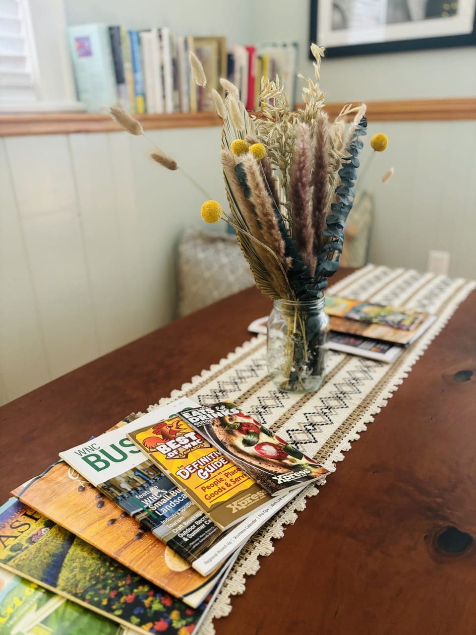 Local guides and a diverse library complement your work nook and dining area.