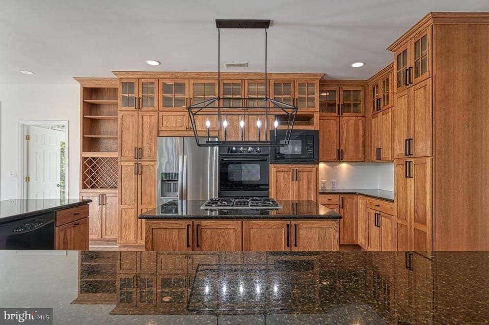 The kitchen is fully equipped and comfortable with 9 comfy stools for dining