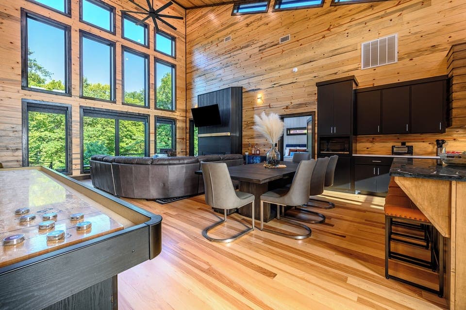 Open living/dining area with shuffle board