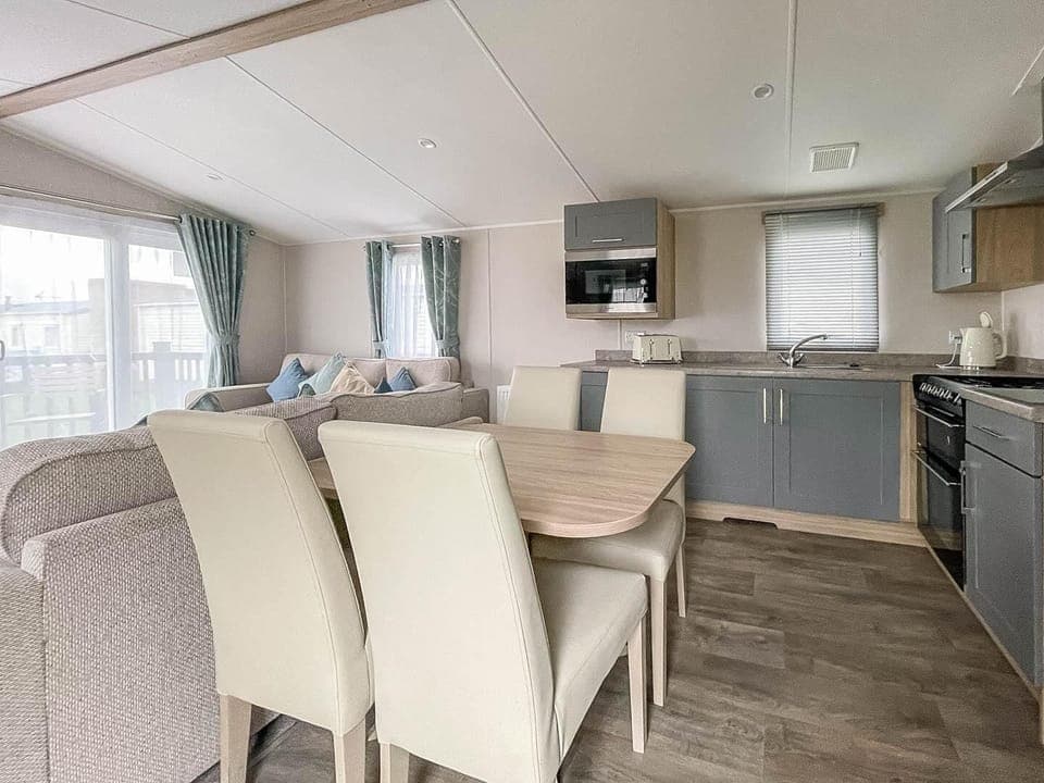 Plan your bank holidays 2026 with a last minute staycation at Naze Marine Holiday Park Essex, offering cosy caravan holidays Essex complete with a comfortable kitchen area in a caravan.